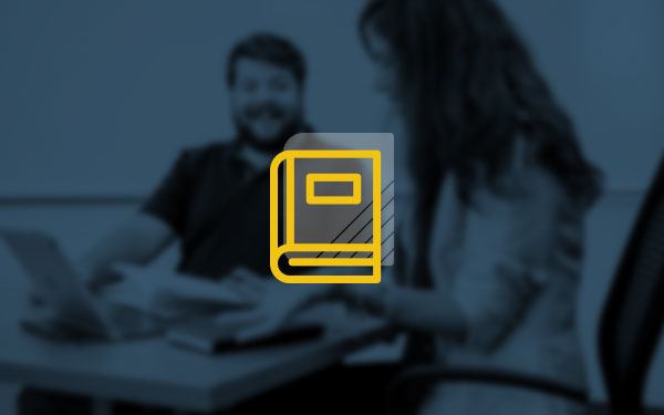 classroom shot with book icon on top