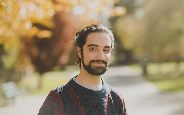 male student outdoors on the quad