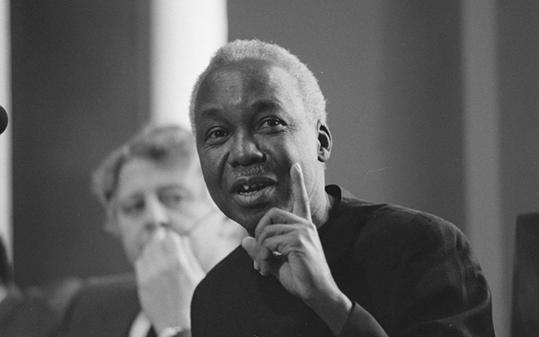 Julius Nyerere sits and is speaking