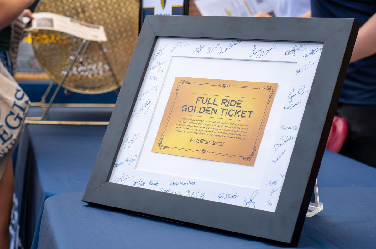 framed and signed golden ticket that guarantees free tuition 