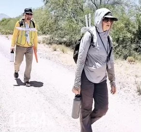 Jake Bucher and Melissa Nix walk along the Migrant Trail Walk in Arizona